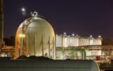Oil And Gas Storage Tanks At Night
