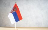 Serbia table flag on white textured wall