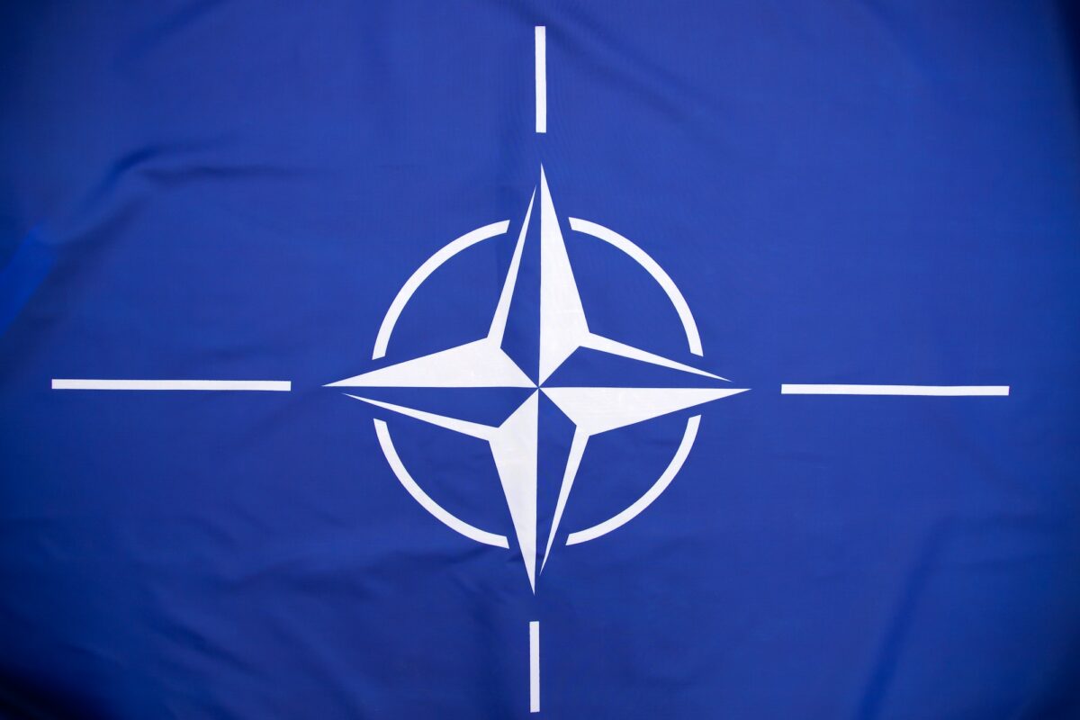 NATO flag.North Atlantic Treaty Organization flag waving.